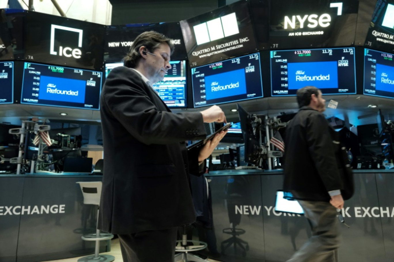 Des opérateurs du New York Stock Exchange © SPENCER PLATT