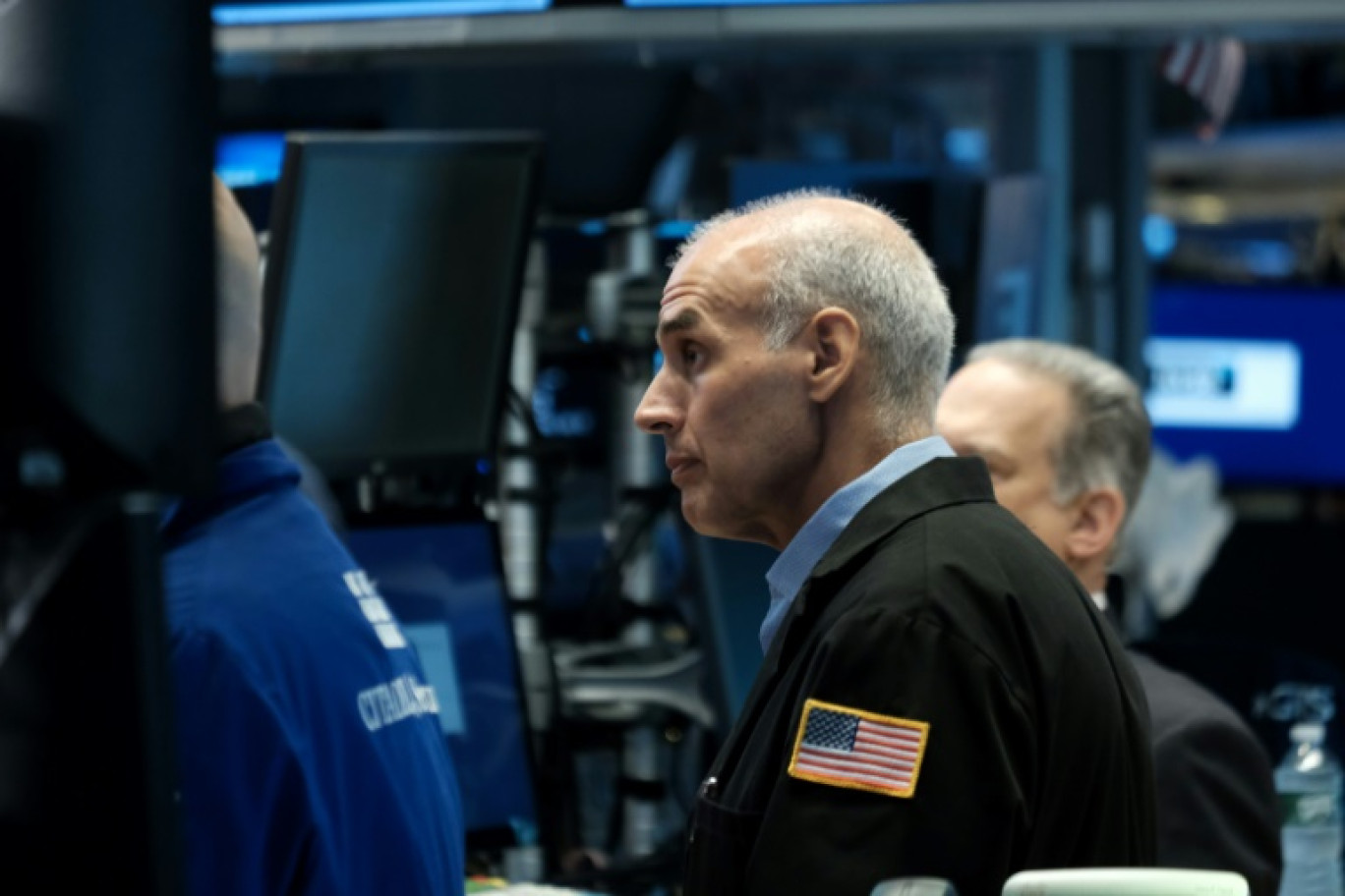 Des opérateurs du New York Stock Exchange © SPENCER PLATT