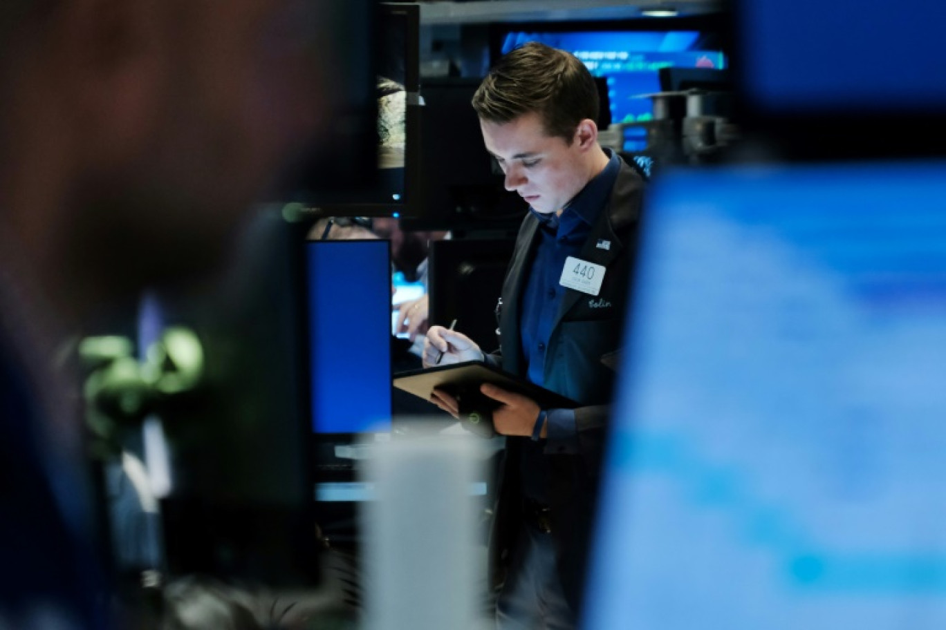 Un opérateur du New York Stock Exchange © SPENCER PLATT