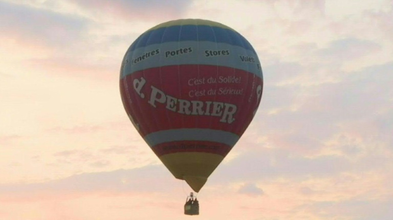 Des montgolfières décollent pour le premier jour du Mondial Air Ballon, le 21 juillet 2023 à Hagéville, en Meurthe-et-Moselle © Jean-Christophe VERHAEGEN