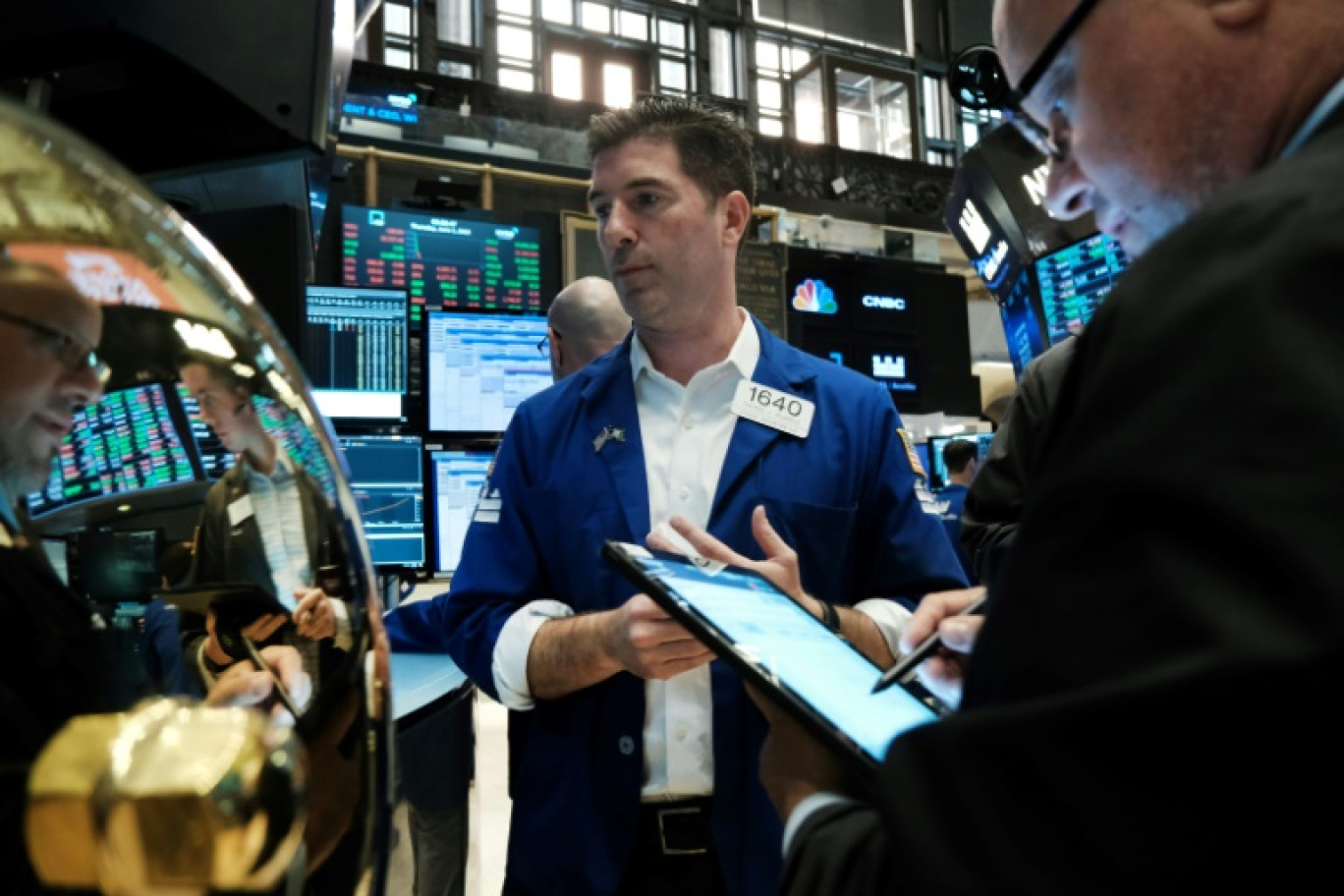 Des opérateurs du New York Stock Exchange © SPENCER PLATT