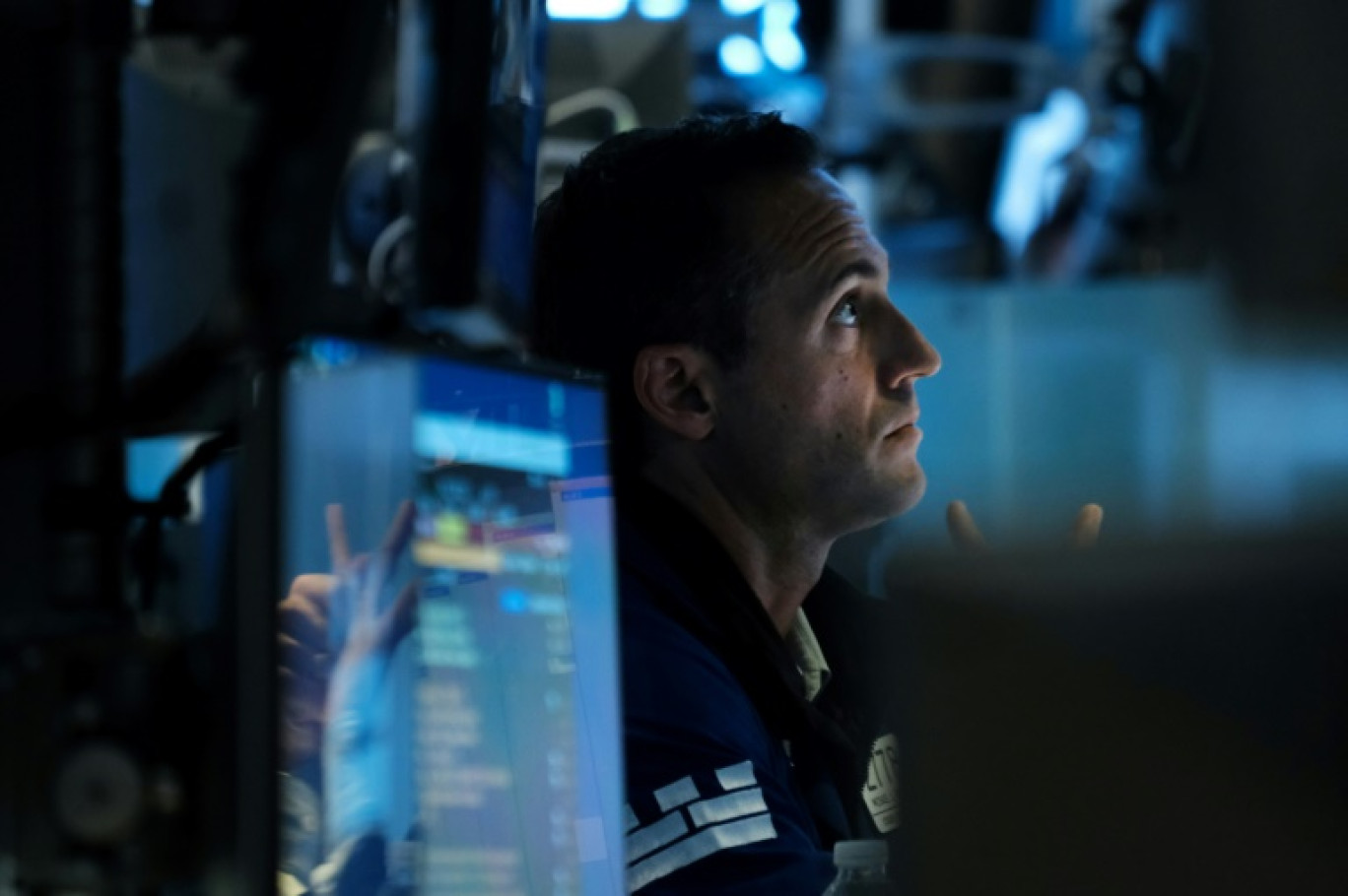 Un opérateur du New York Stock Exchange © SPENCER PLATT