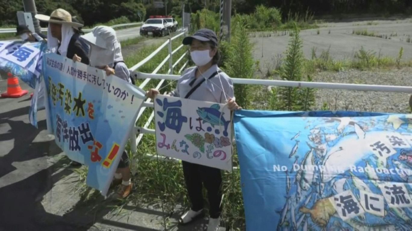 Manifestation contre le rejet en mer de l'eau de la centrale nucléaire japonaise de Fukushima, le 24 août 2024 à Séoul, en Corée du Sud © Jung Yeon-je