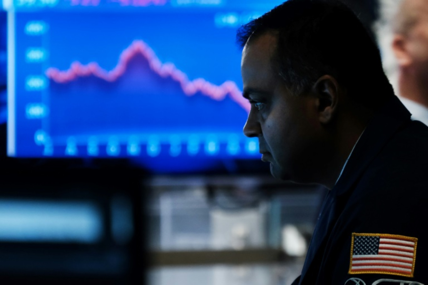 Un opérateur du New York Stock Exchange © SPENCER PLATT