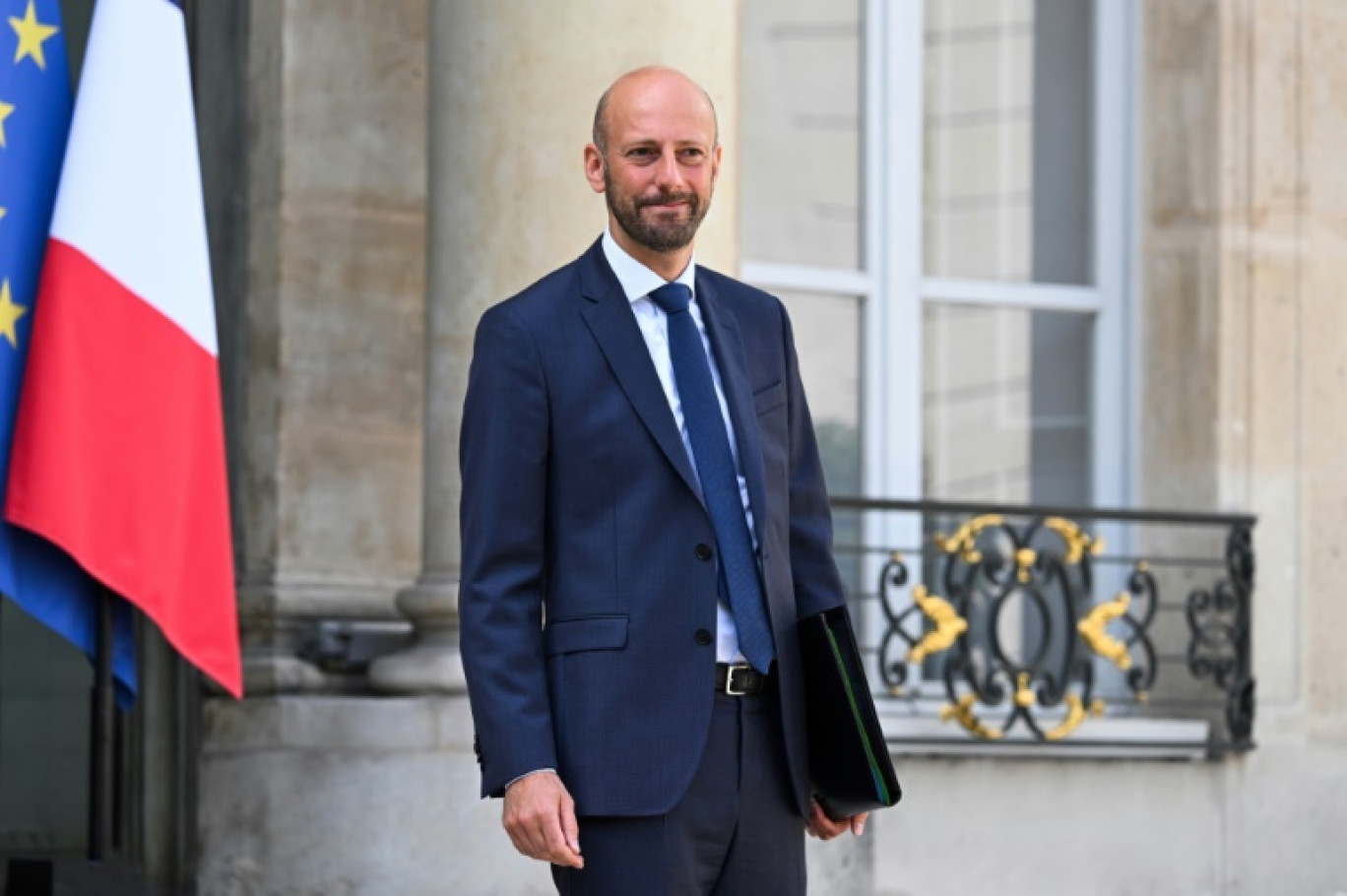 Le ministre de la Fonction publique Stanislas Guerini à la sortie de l'Elysée, le 23 août 2023 à Paris © Bertrand GUAY