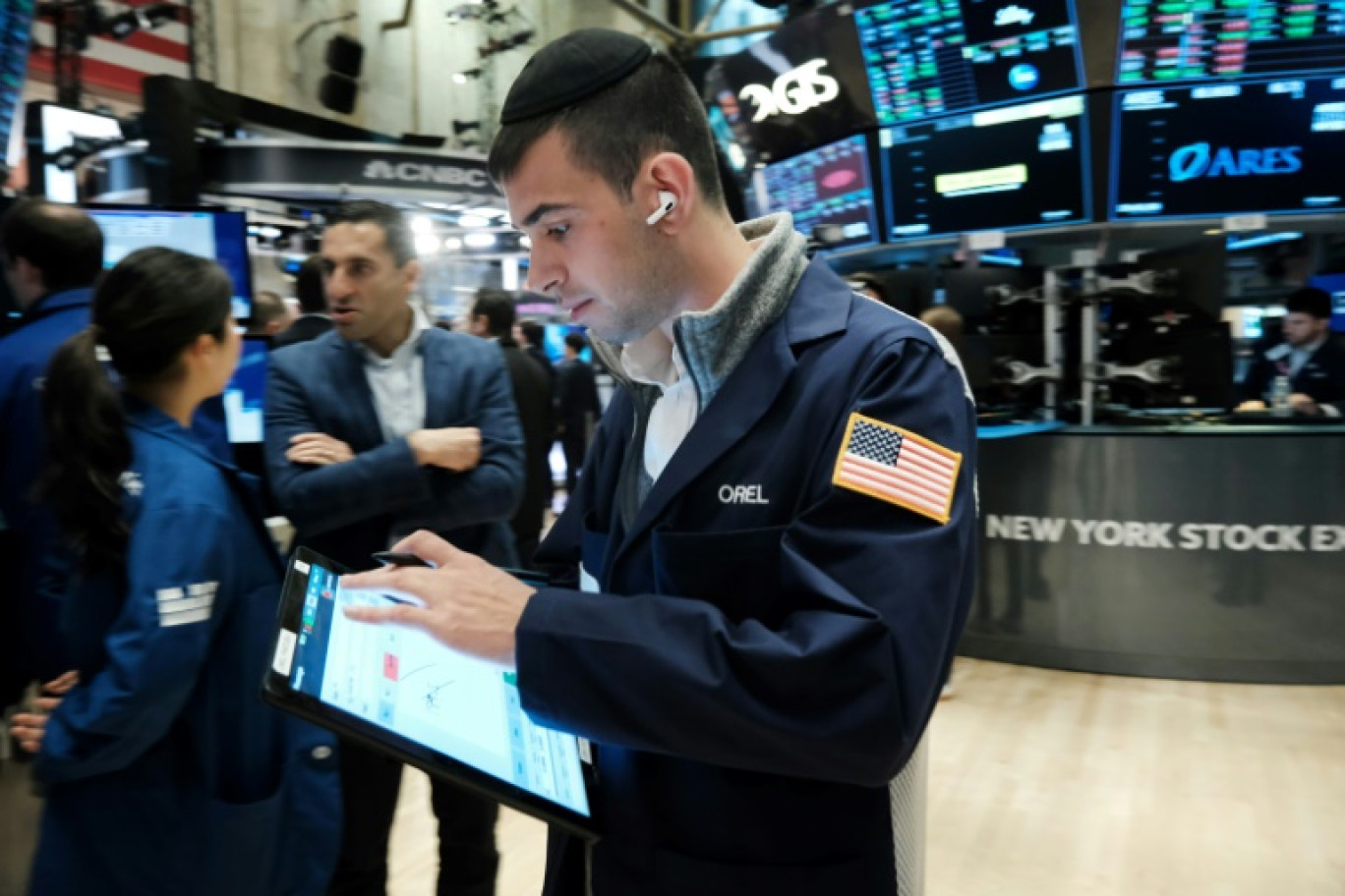 Un opérateur du New York Stock Exchange © SPENCER PLATT