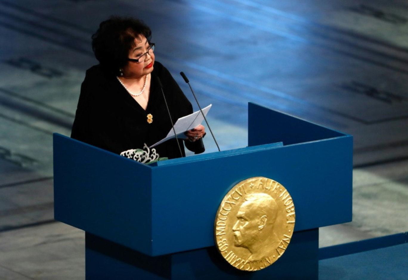 Setsuko Thurlow, survivante du bombardement de Hiroshima, reçoit le prix Nobel de la paix pour la Campagne internationale pour l'abolition des armes nucléaires (ICAN), le 10 décembre 2017 à Oslo © Odd ANDERSEN