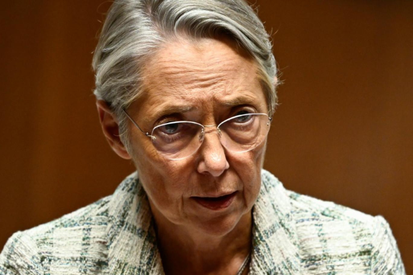 La Première ministre Elisabeth Borne lors de la présentation des mesures du gouvernement en réponse aux émeutes urbaines de juin, le 26 octobre 2023 à l'Université de la Sorbonne, à Paris © Thomas SAMSON