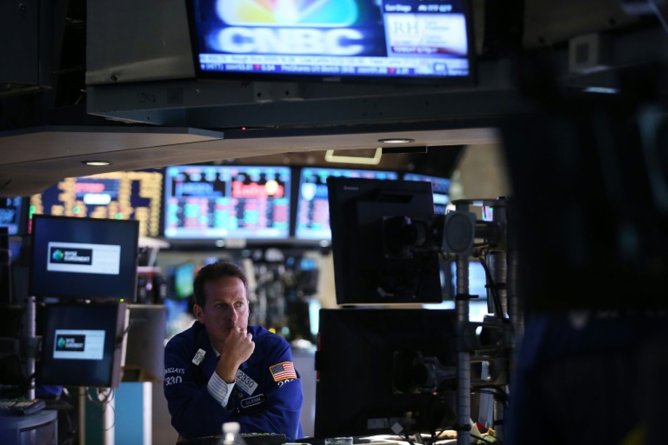 Un opérateur du New York Stock Exchange © SPENCER PLATT