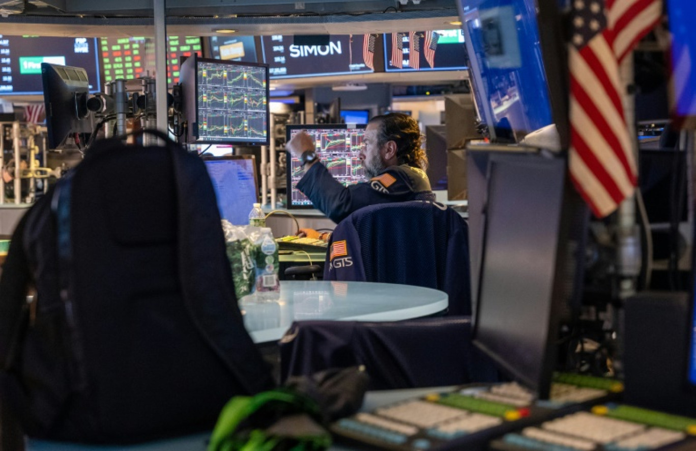 Un opérateur du New York Stock Exchange © SPENCER PLATT