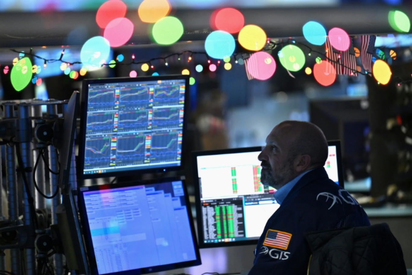 Un opérateur du New York Stock Exchange © ANGELA WEISS