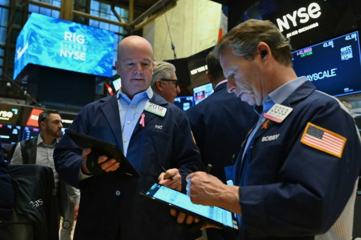 Des opérateurs du New York Stock Exchange © ANGELA WEISS