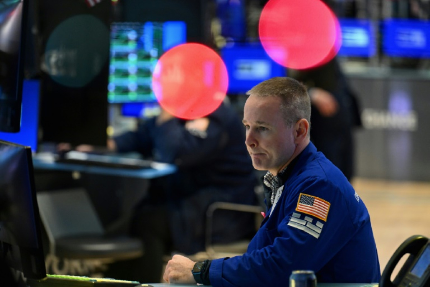 Un opérateur du New York Stock Exchange © ANGELA WEISS