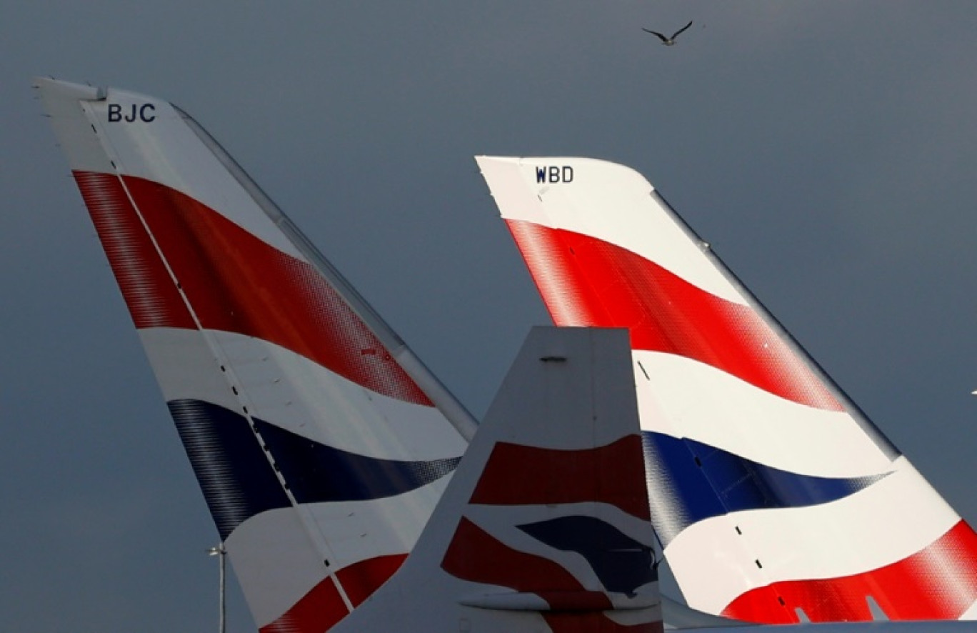 Des avions de la compagnie British Airways sur le tarmac de l'aéroport londonien d'Heathrow, le 5 février 2021 © Adrian DENNIS