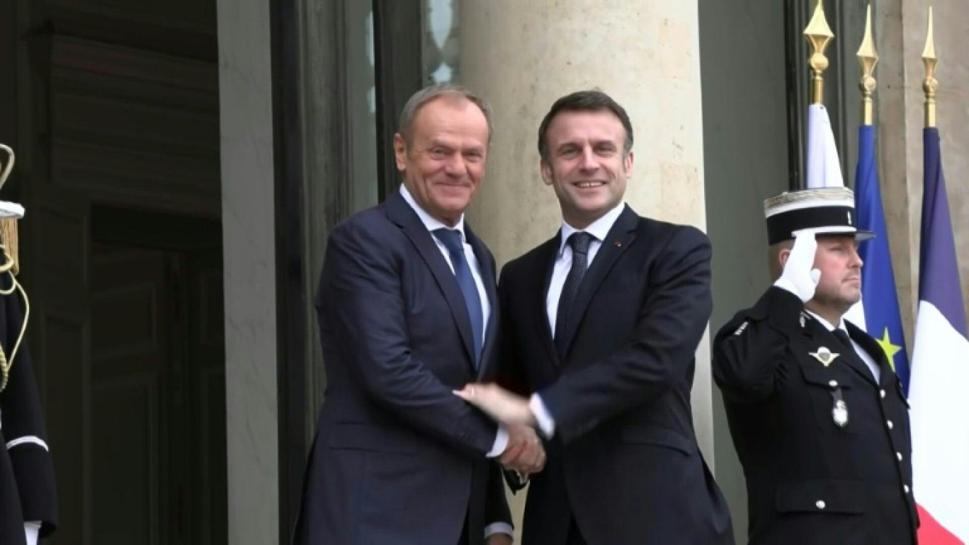 Chaleureuses retrouvailles franco-polonaises, Macron et Tusk défendent la "sécurité" de l'Europe