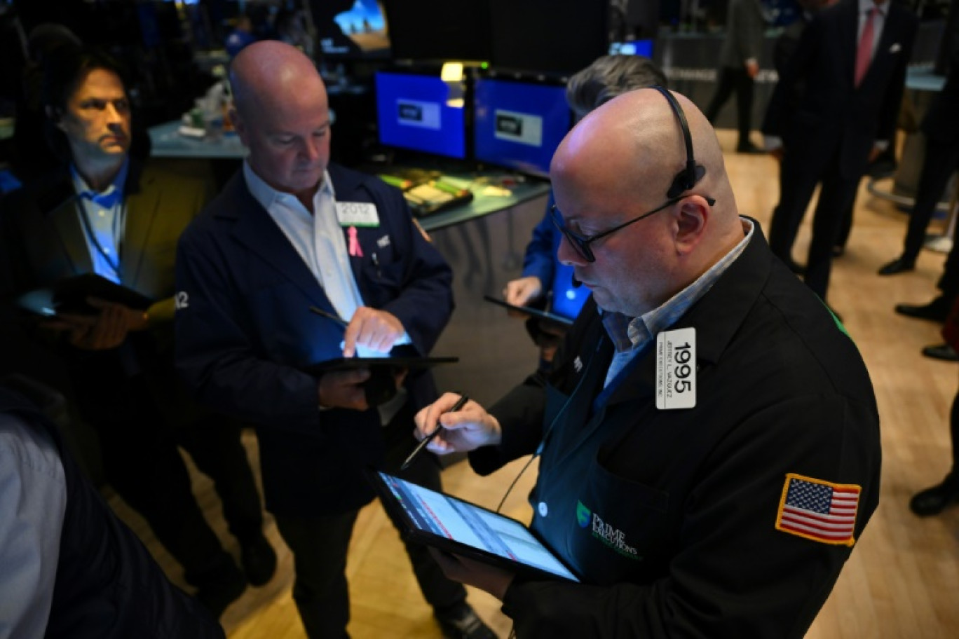 Des opérateurs du New York Stock Exchange © ANGELA WEISS