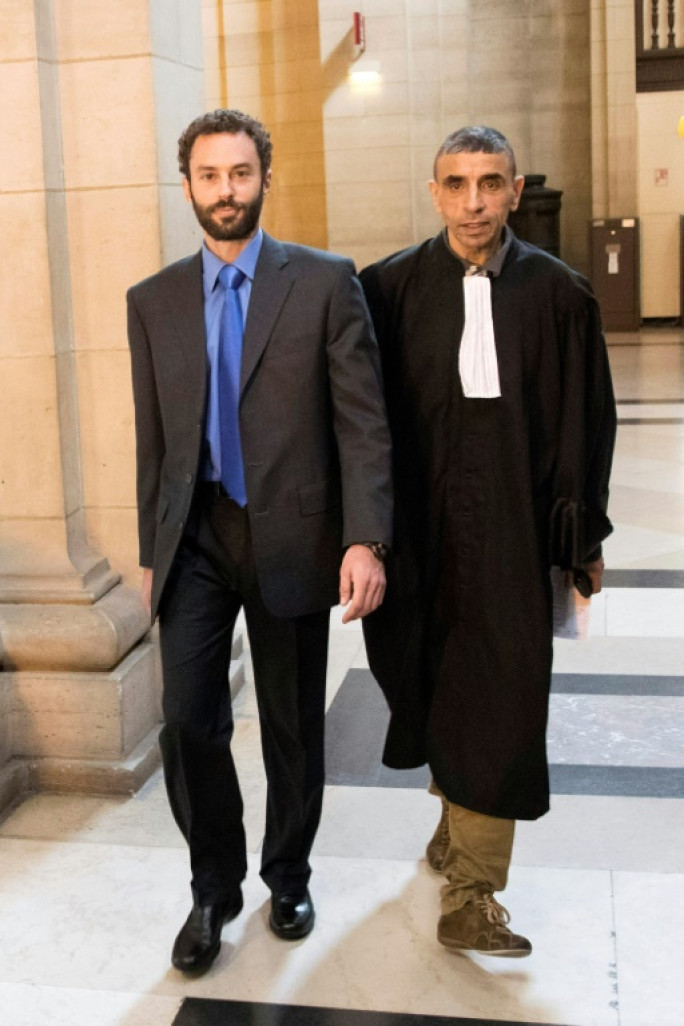 Alec Wildenstein (g), et son avocat, au tribunal de Paris, le 22 septembre 2016 © -