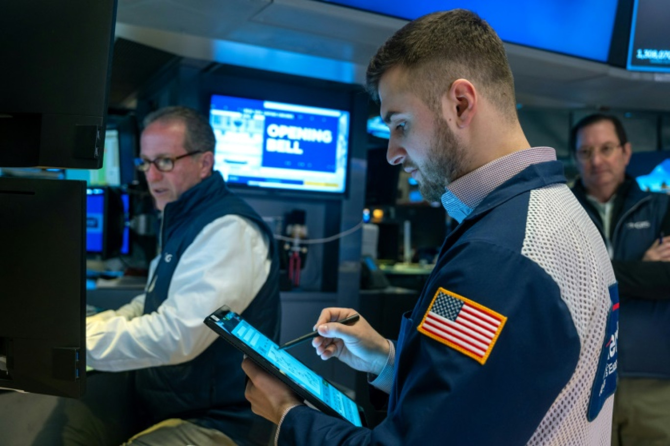 Des opérateurs du New York Stock Exchange © SPENCER PLATT