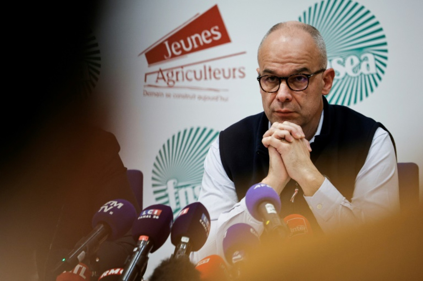 Le président de FNSEA Arnaud Rousseau lors d'une conférence de presse conjointe avec les Jeunes Agriculteurs (JA) à Paris, le 13 février 2024 © GEOFFROY VAN DER HASSELT