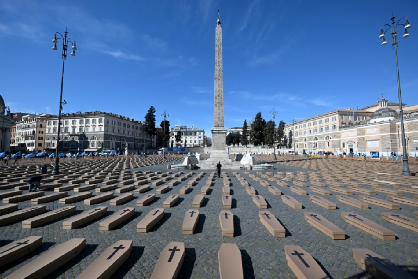 Cardbord coffins are set at Piazza del Popolo by Italian Labor Union (UIL) during a campaign 'Zero dead at work' to draw public attention to the tragedy of deaths at work, on March 19, 2024 in Rome. © Tiziana FABI