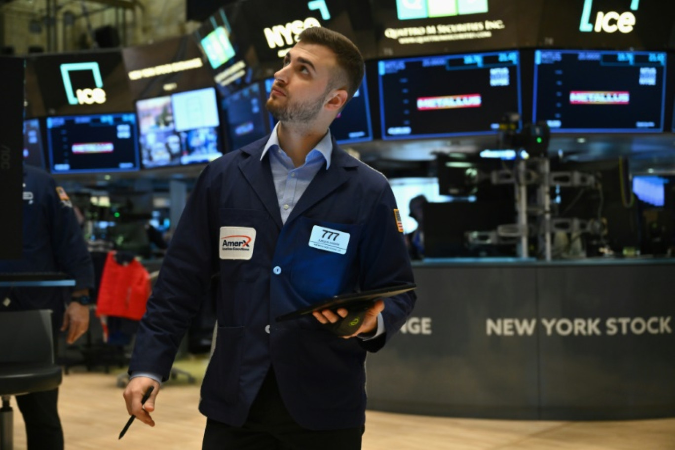 Un opérateur du New York Stock Exchange © ANGELA WEISS