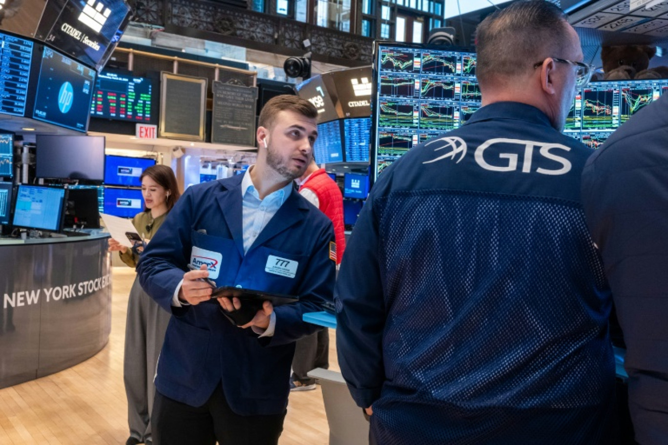 Des opérateurs du New York Stock Exchange © SPENCER PLATT