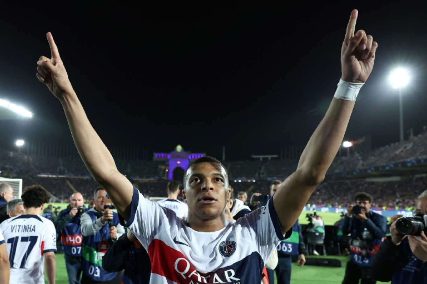 L'attaquant du Paris Saint-Germain Kylian Mbappé, le 16 avril 2024 à Barcelone après la victoire en quart de finale de Ligue des champions. © FRANCK FIFE