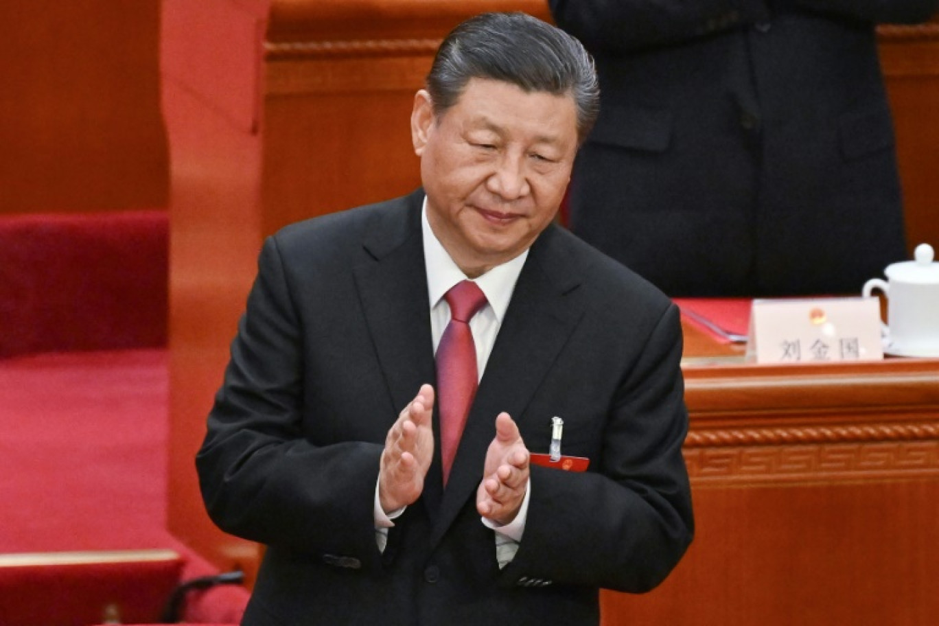 Le président chinois Xi Jinping, le 11 mars 2024 à Pékin © GREG BAKER