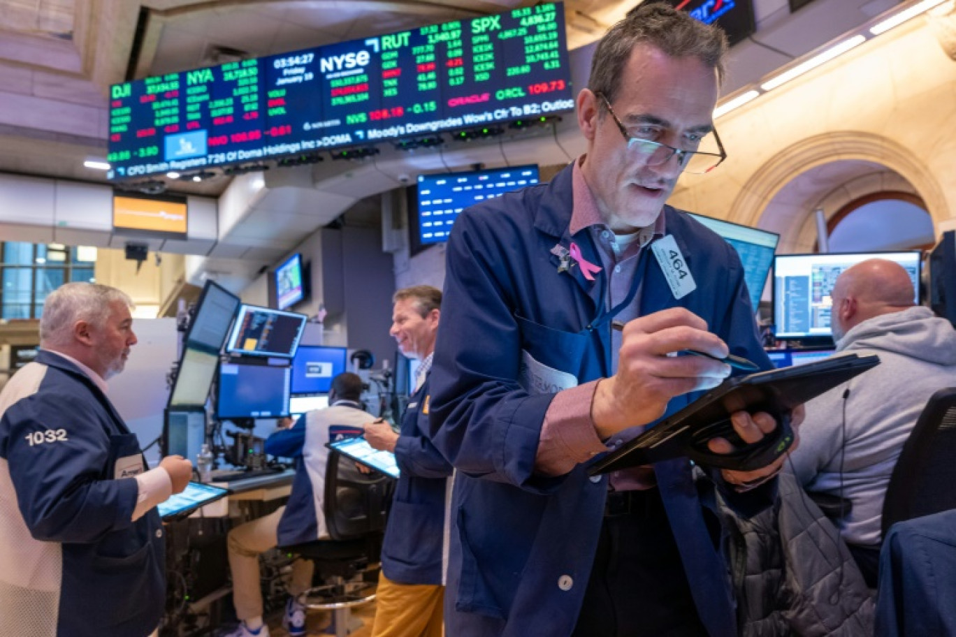 Des opérateurs du New York Stock Exchange © SPENCER PLATT