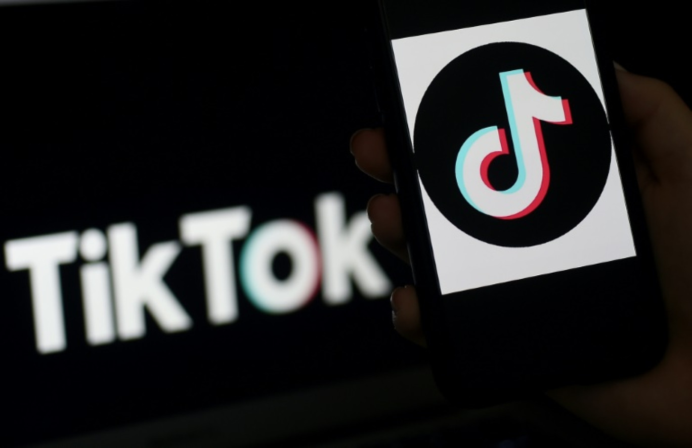 Le logo de TikTok sur un écran d'iPhone, le 13 avril 2020 à Arlington, aux Etats-Unis © Olivier DOULIERY