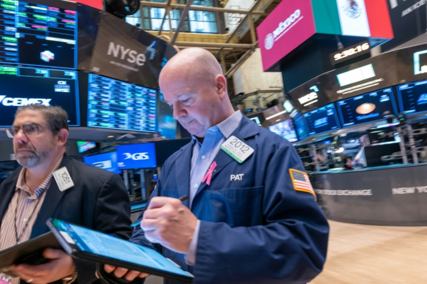 Un opérateur du New York Stock Exchange © SPENCER PLATT