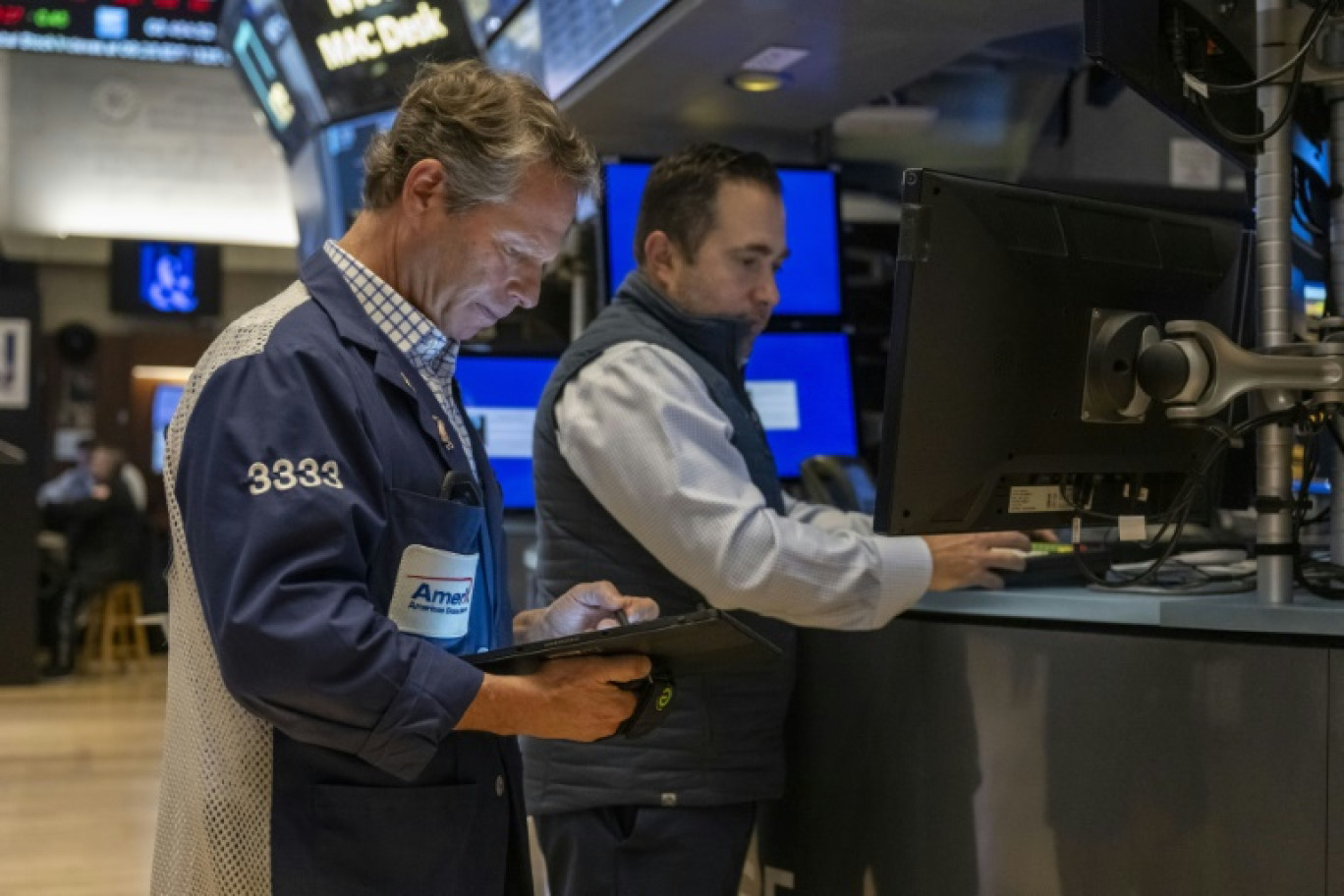 Des opérateurs du New York Stock Exchange © ANGELA WEISS