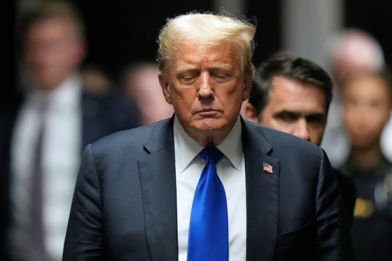 Donald Trump s'apprête à parler aux médias à la sortie du tribunal de New York après avoir été reconnu coupable de 34 chefs d'accusation, le 30 mai 2024 © Seth Wenig