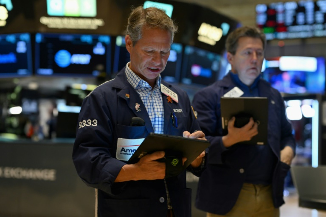 Des opérateurs du New York Stock Exchange © ANGELA WEISS