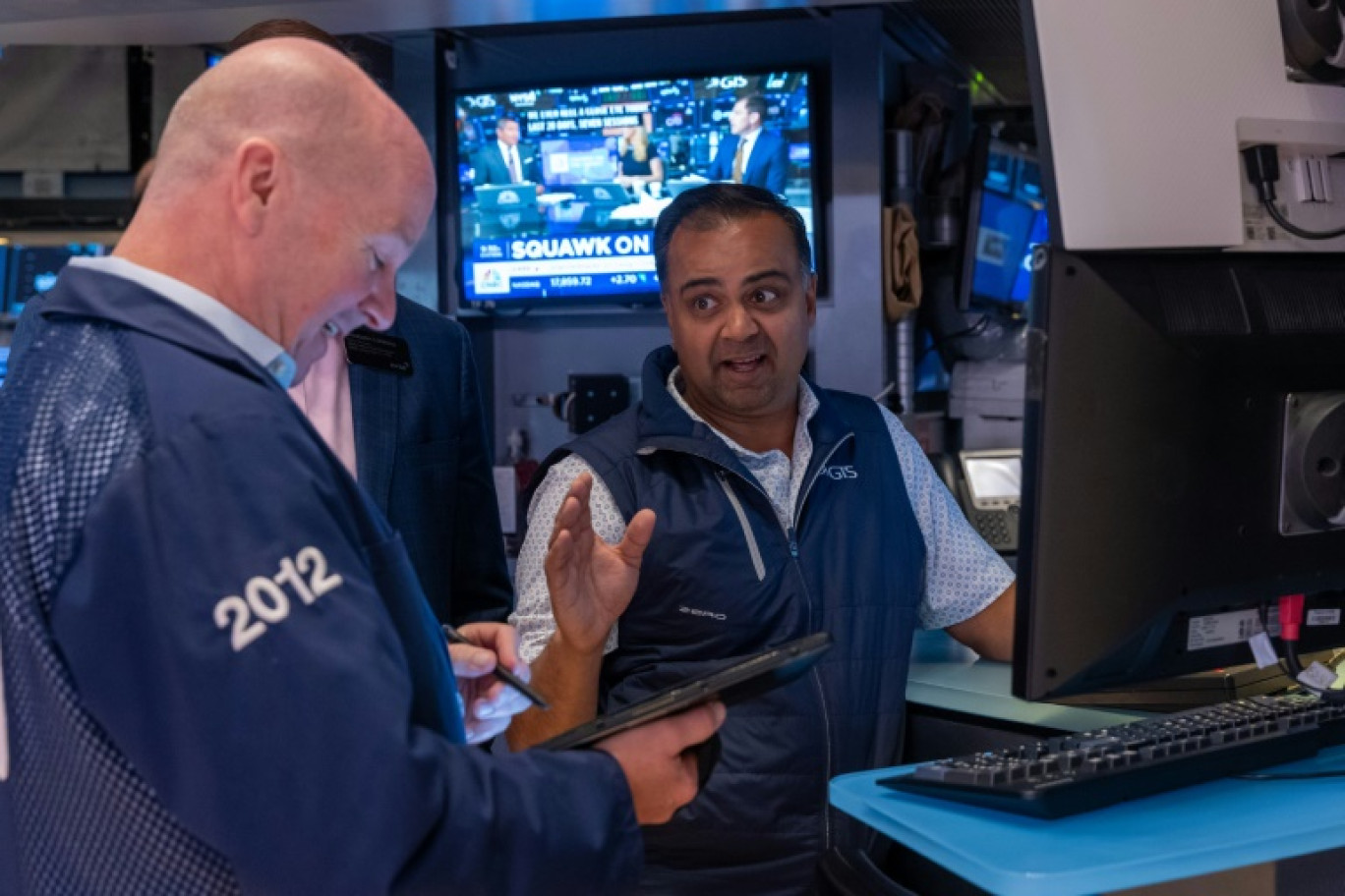 Des opérateurs du New York Stock Exchange © SPENCER PLATT