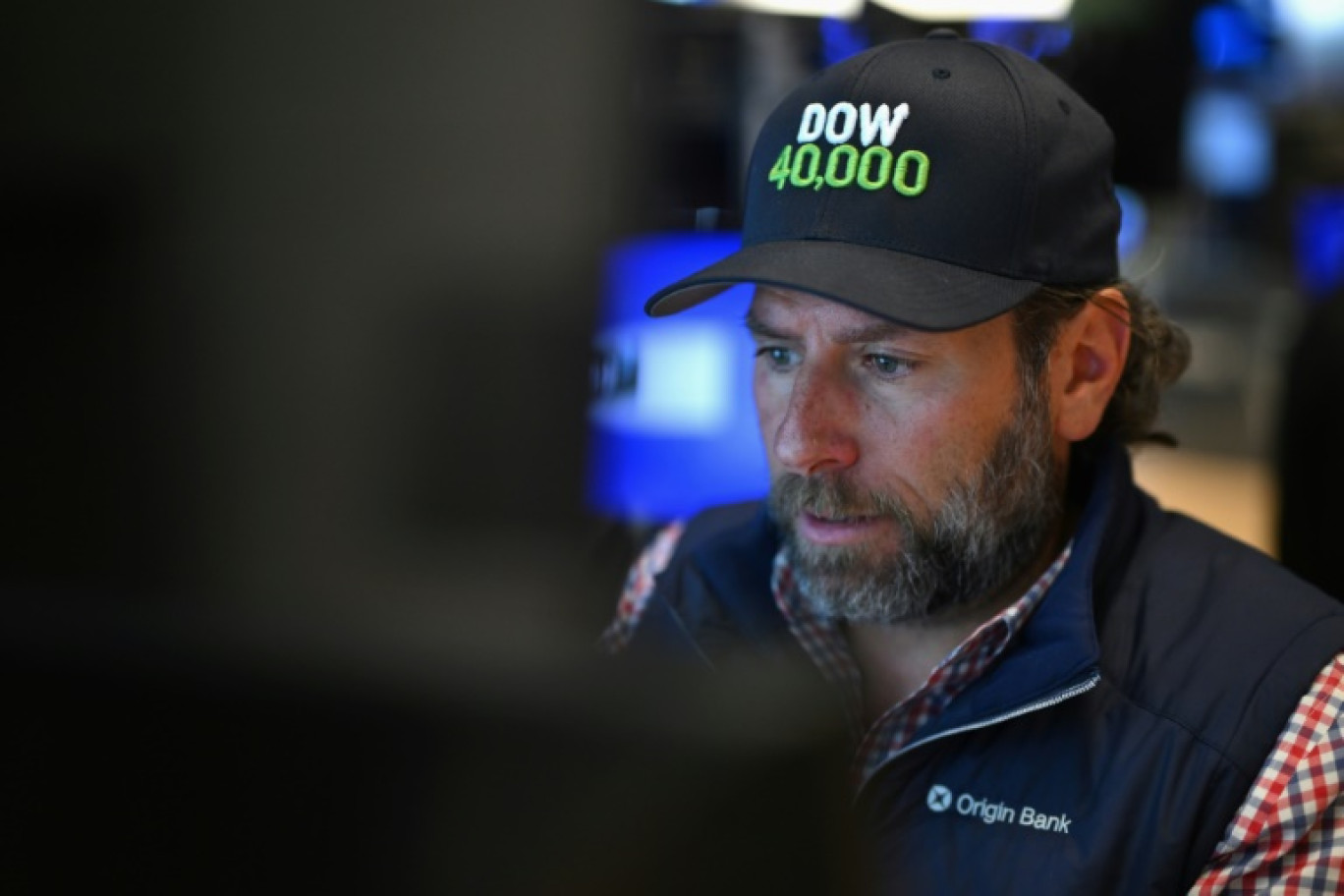 Un opérateur du New York Stock Exchange © ANGELA WEISS