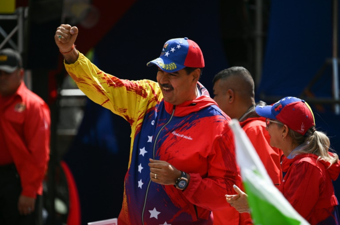 Le président vénézuélien Nicolas Maduro (g) et son épouse Cilia Flores (d) lors d'un rassemblement à Caracas, le 29 février 2024 © Federico PARRA