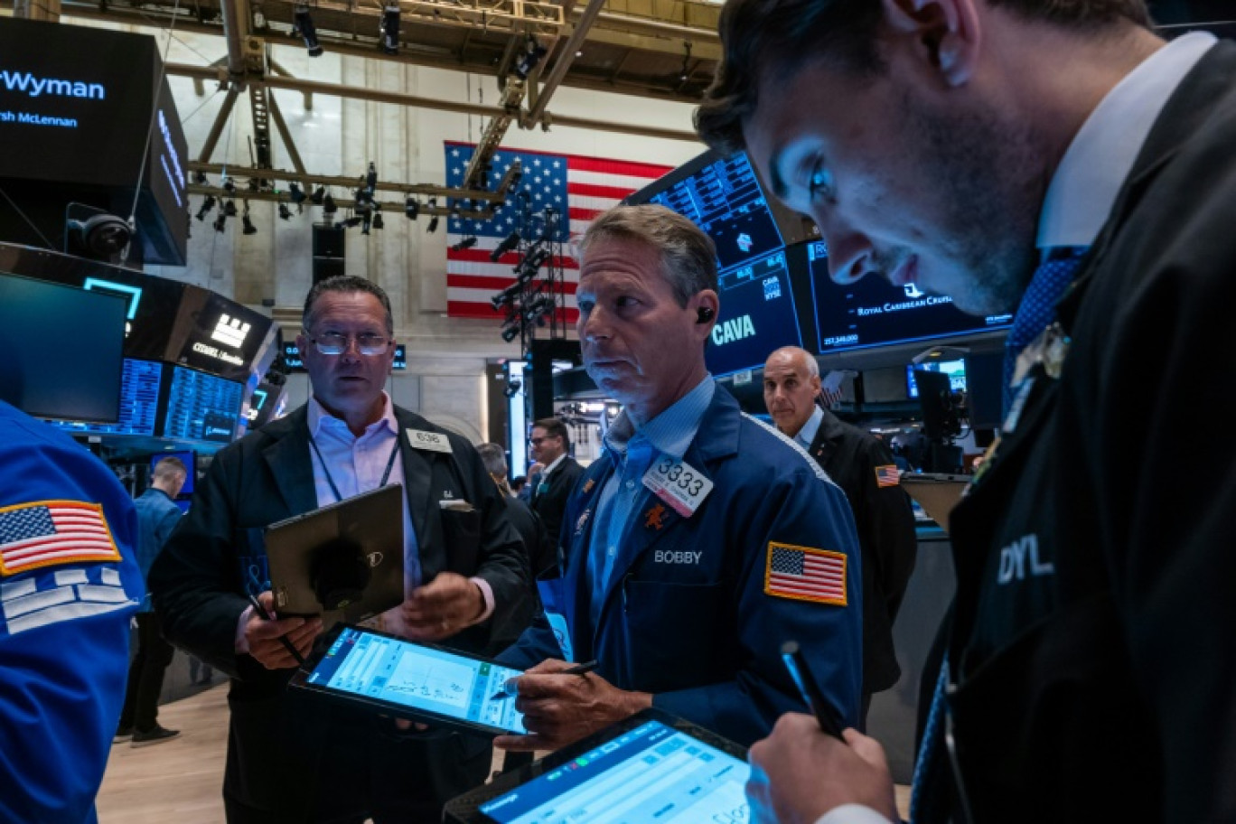 Des opérateurs du New York Stock Exchange © SPENCER PLATT