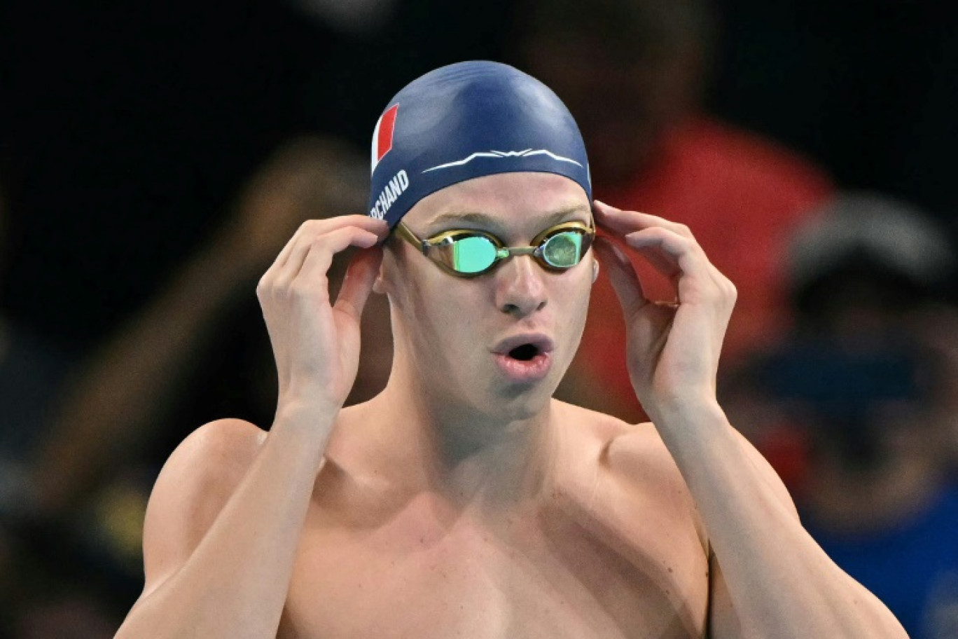 Le Français Léon Marchand s'apprête à participer à la finale de l'épreuve de natation du 200 m brasse hommes lors des Jeux olympiques de Paris 2024 à l'Arena Paris La Défense à Nanterre, à l'ouest de Paris, le 31 juillet 2024 © Jonathan NACKSTRAND