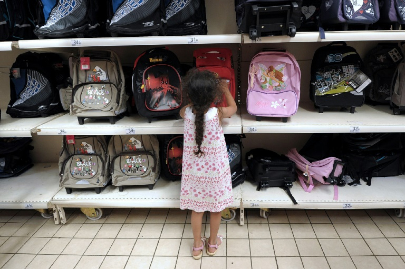 Le retour en classe pèsera cette année moins lourd dans le portefeuille des familles, selon des études d'associations © FREDERICK FLORIN