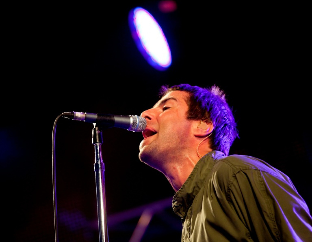 Liam Gallagher du groupe de rock britannique Oasis en concert au Roskilde Festival, le 3 juillet 2009 au Danemark © Torben Christensen