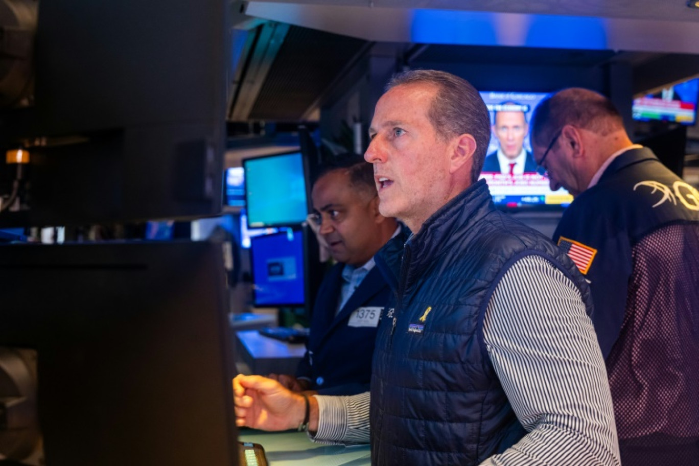 Des opérateurs du New York Stock Exchange © SPENCER PLATT