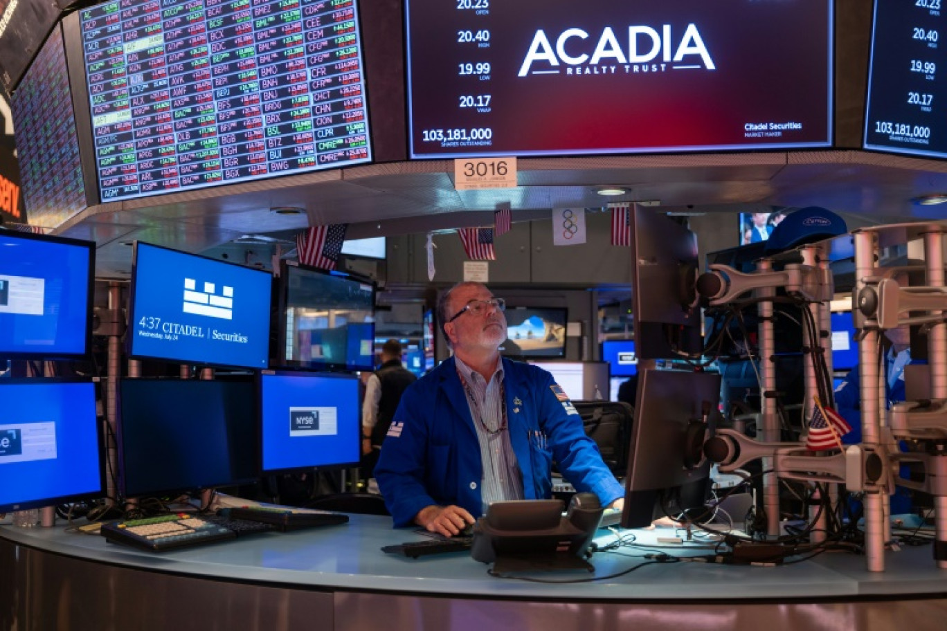 Un opérateur du New York Stock Exchange © SPENCER PLATT