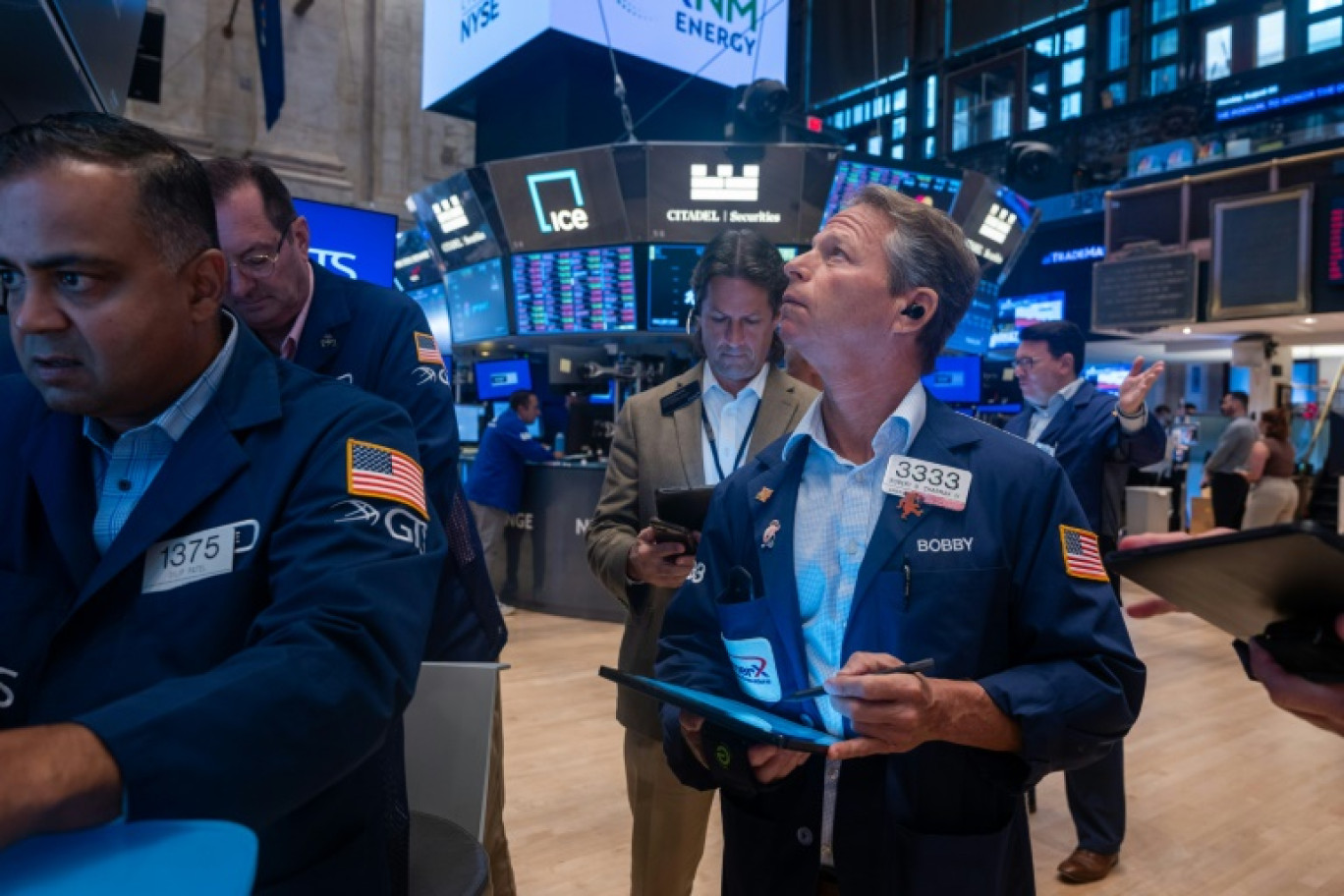 Des opérateurs du New York Stock Exchange © SPENCER PLATT