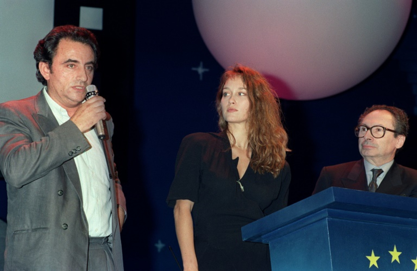 L'acteur Richard Bohringer (G) présente le dernier film du réalisateur Jean-Charles Tacchella (D), "Les Dames Galantes", dans lequel il joue avec Marianne Basler (C),  le 13 octobre 1990 lors du 1er festival du Film européen de La Baule © Frank PERRY