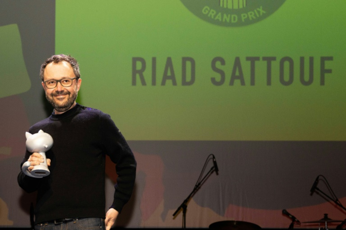 L'auteur de bandes dessinées Riad Sattouf reçoit le "Grand Prix" du 50e Festival international de la bande dessinée d'Angoulême, dans l'ouest de la France, le 25 janvier 2023 © YOHAN BONNET