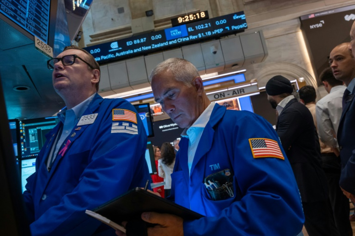 Des opérateurs du New York Stock Exchange © SPENCER PLATT