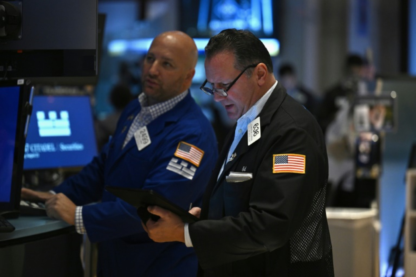 Des opérateurs du New York Stock Exchange © ANGELA WEISS