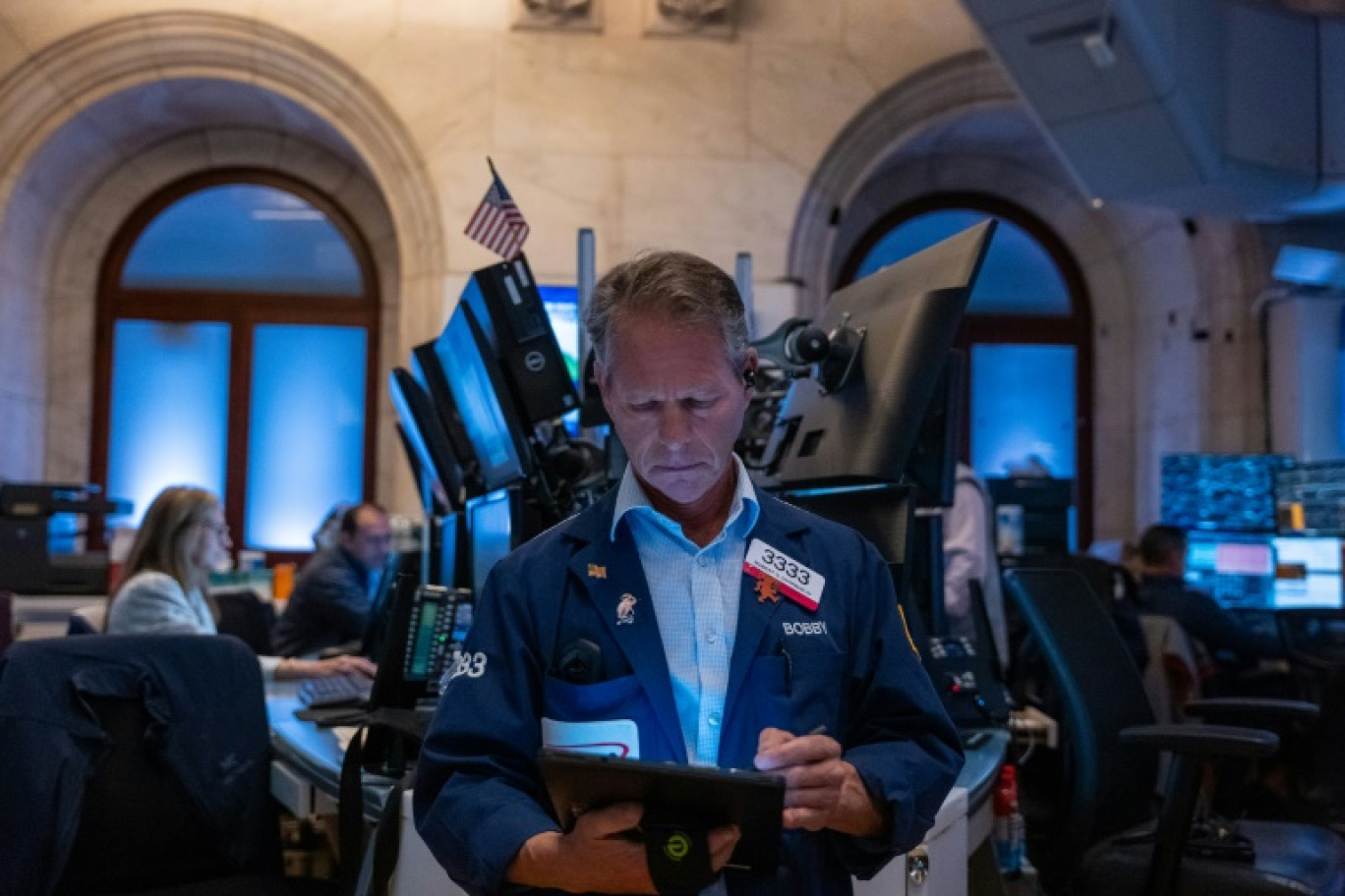 Un opérateur du New York Stock Exchange © SPENCER PLATT