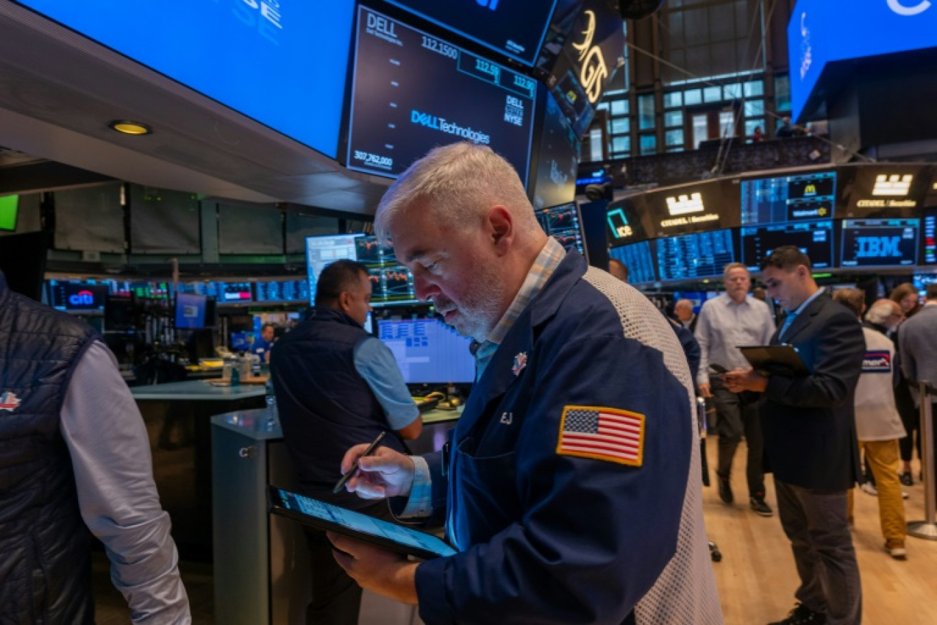 Des opérateurs du New York Stock Exchange © SPENCER PLATT